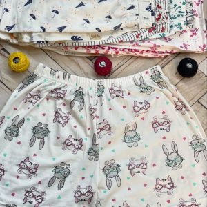 شورت پادار تمام چاپ زمینه سفید مارک لادن(جین ۱۲تایی)